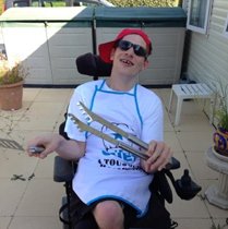 Ryan cooking at the BBQ on a recent family holiday
