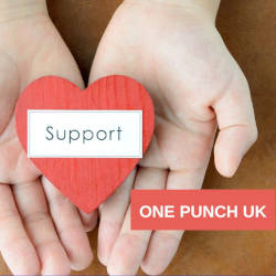 Open hands holding a sign saying "Support" illustrating One Punch Awareness Week